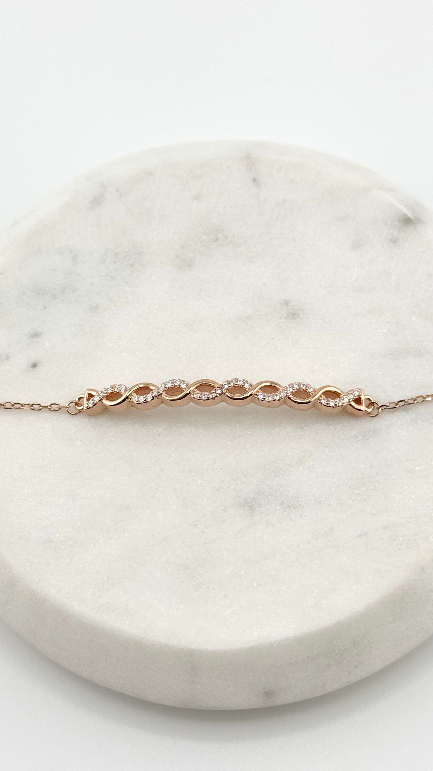 Sterling Silver Bracelet with Criss-Cross Solid Stud Design (Adjustable)