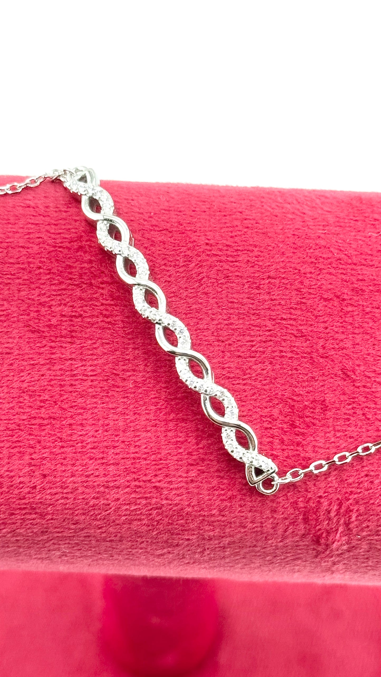 Sterling Silver Bracelet with Criss-Cross Solid Stud Design (Adjustable)