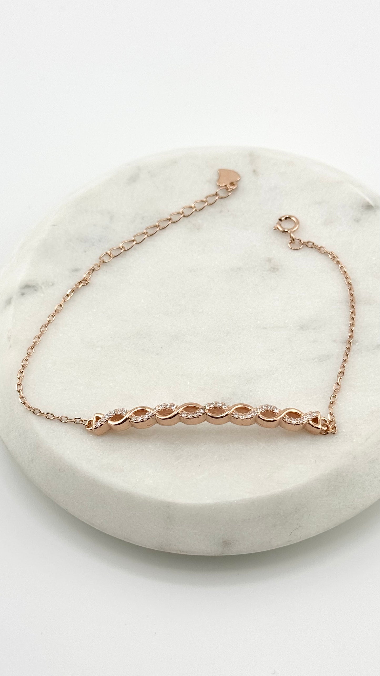 Sterling Silver Bracelet with Criss-Cross Solid Stud Design (Adjustable)